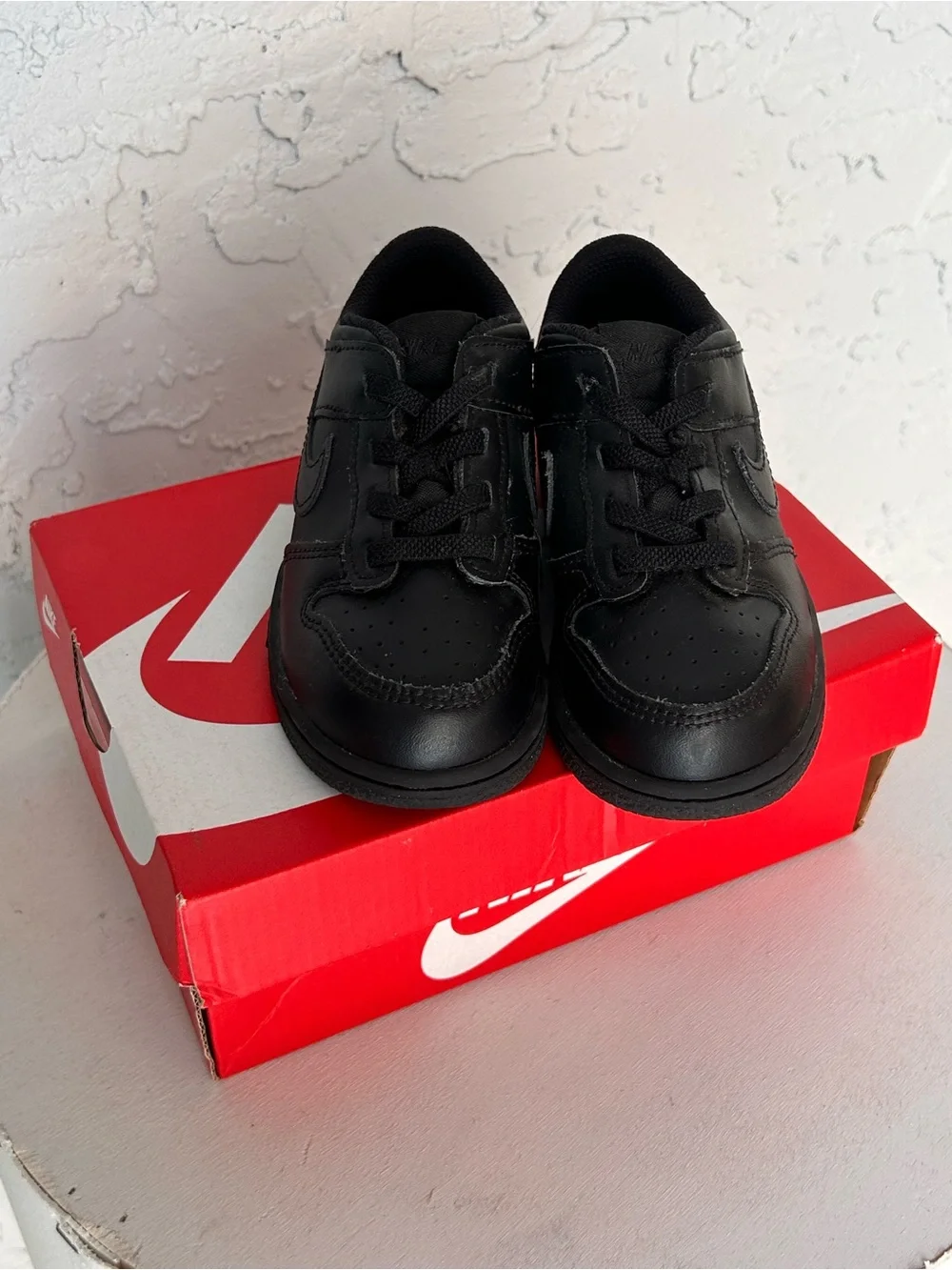 Nike Kids Black Leather Sneakers with Lace-Up Closure